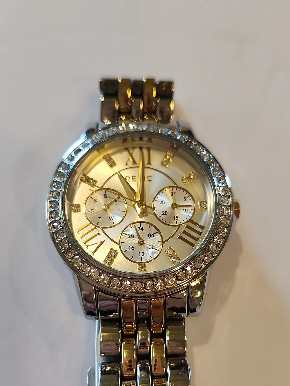 Relic Gold And Silver Tones Watch With Crystal Bezel And Crystal Numerals